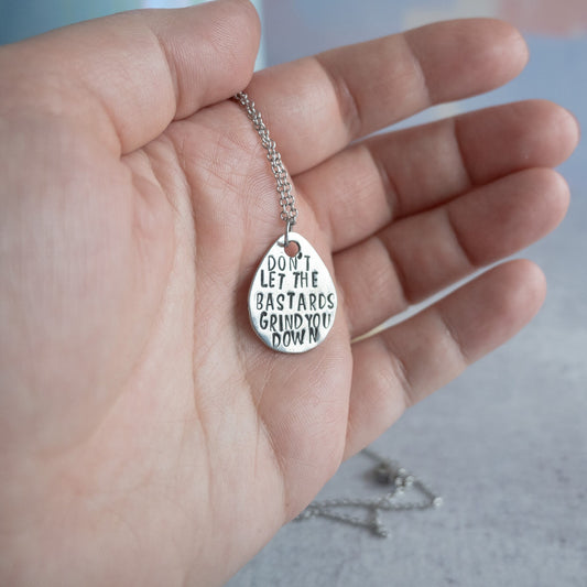 Don't Let the Bastards Grind You Down Necklace